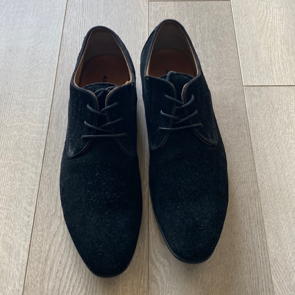 A pair of black men’s, suede Aldo shoes.